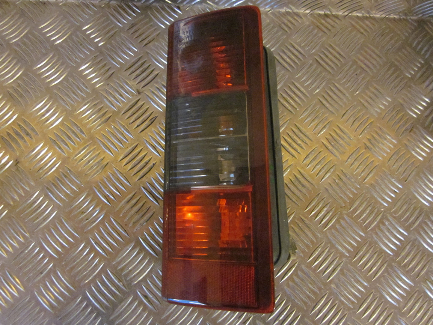 Opel Combo C Baglygte Med OEM Nr. Ophugger Fra Opel Ophugger