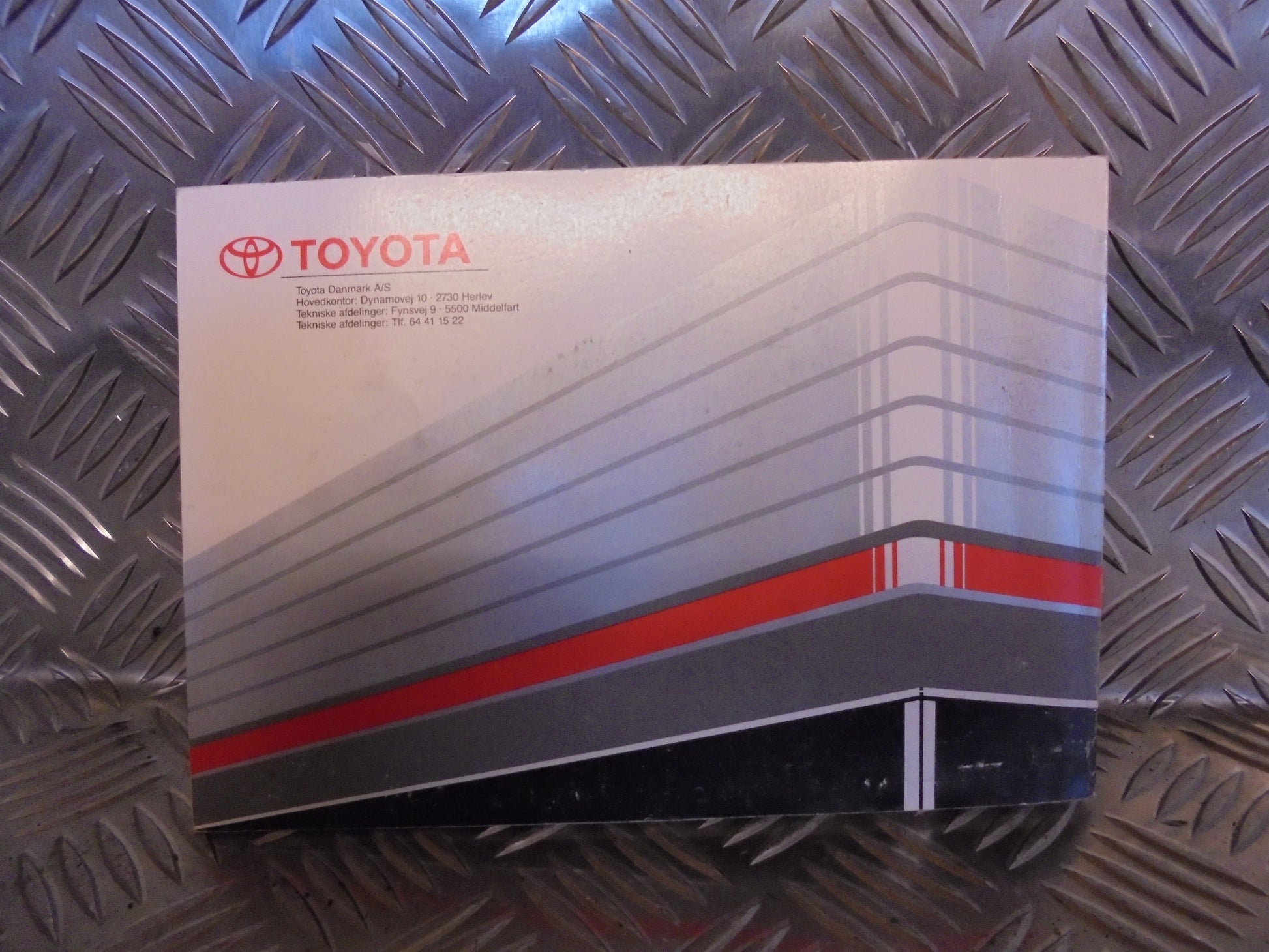 Toyota Corolla 3D–5D HB E100 Instruktionsbog Med OEM Nr. Ophugger Fra Toyota Ophugger