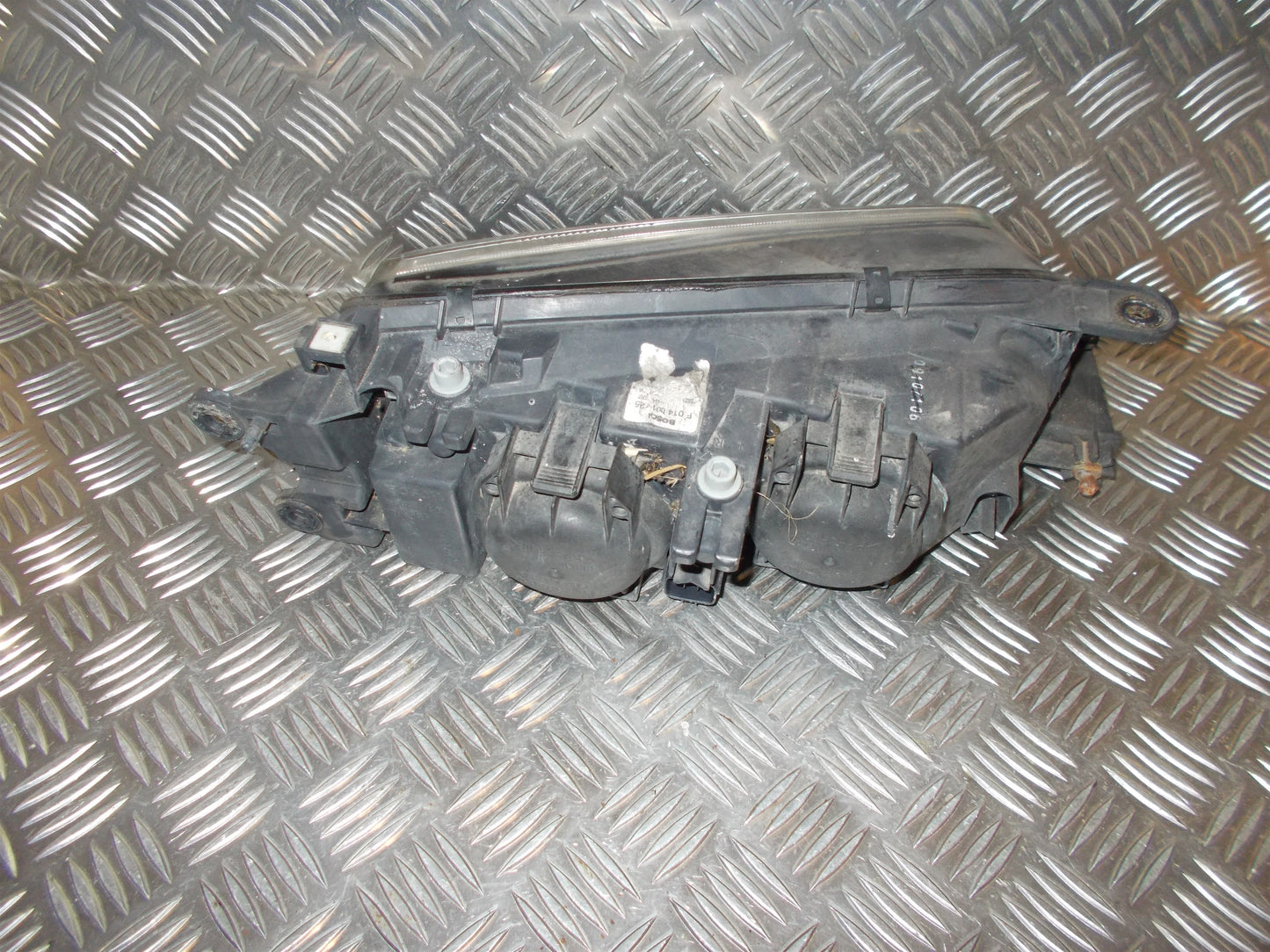 Mazda 626 GF/GW Forlygte Med OEM Nr. GG3E510L0A Fra Mazda Ophugger