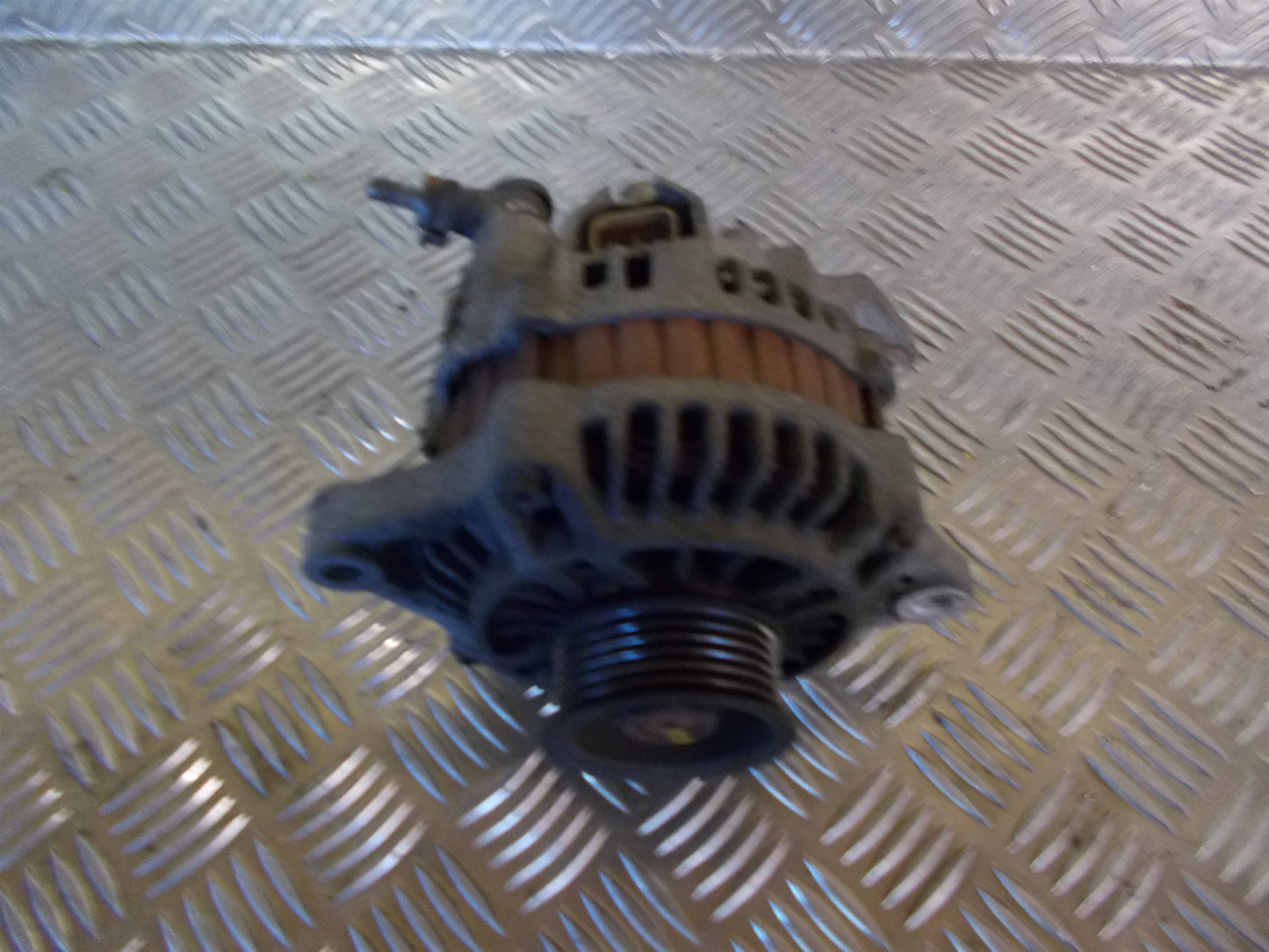 Nissan Almera N16 Generator Med OEM Nr. JA1607IR Fra Nissan Ophugger
