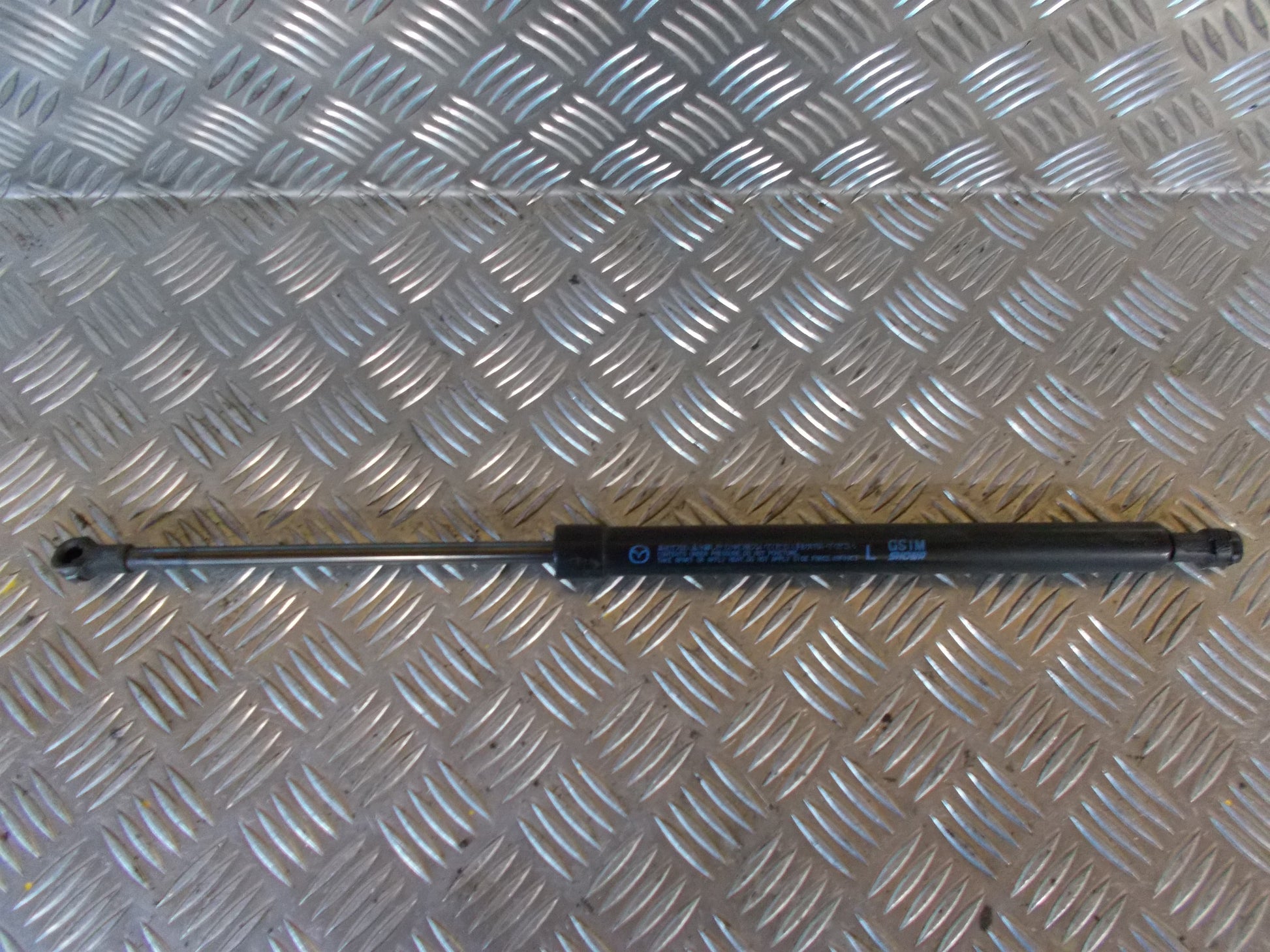 Mazda 6 GH Bagklapsdæmper Med OEM Nr. GS1M Fra Mazda Ophugger