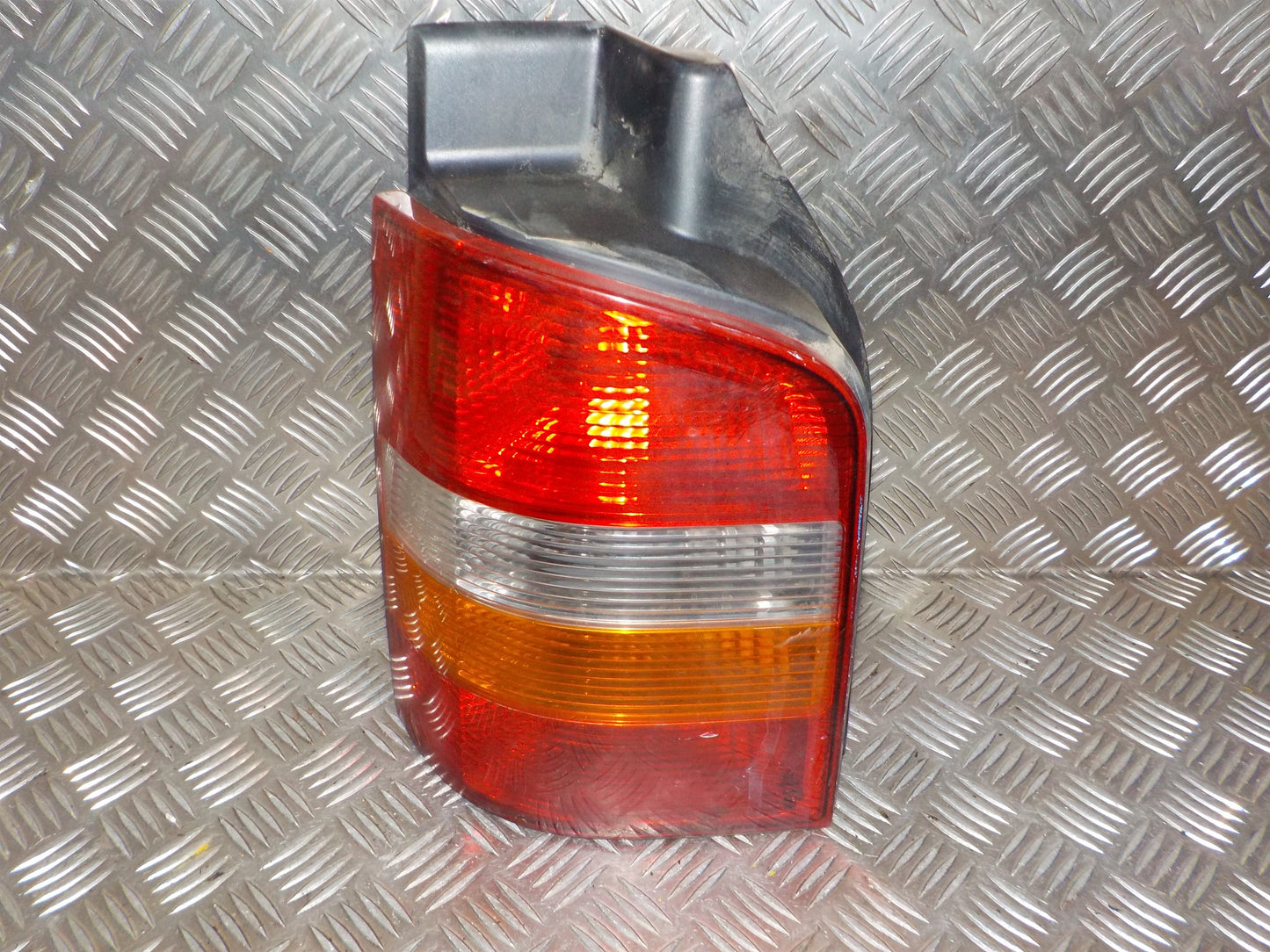 VW Transporter T5 1.Fac: Okt 2009/Jul 2015 Baglygte Med OEM Nr. 7H0945096J Fra VW Ophugger