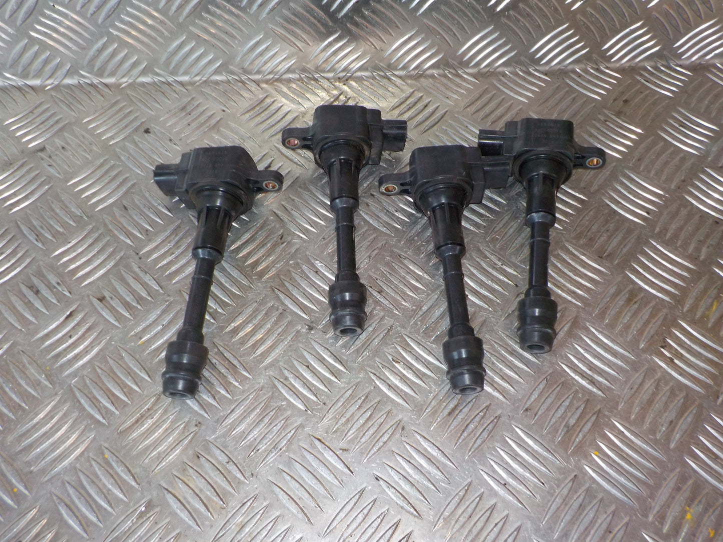 Nissan Primera P12 Tændspole El Med OEM Nr. 224488H315 Fra Nissan Ophugger