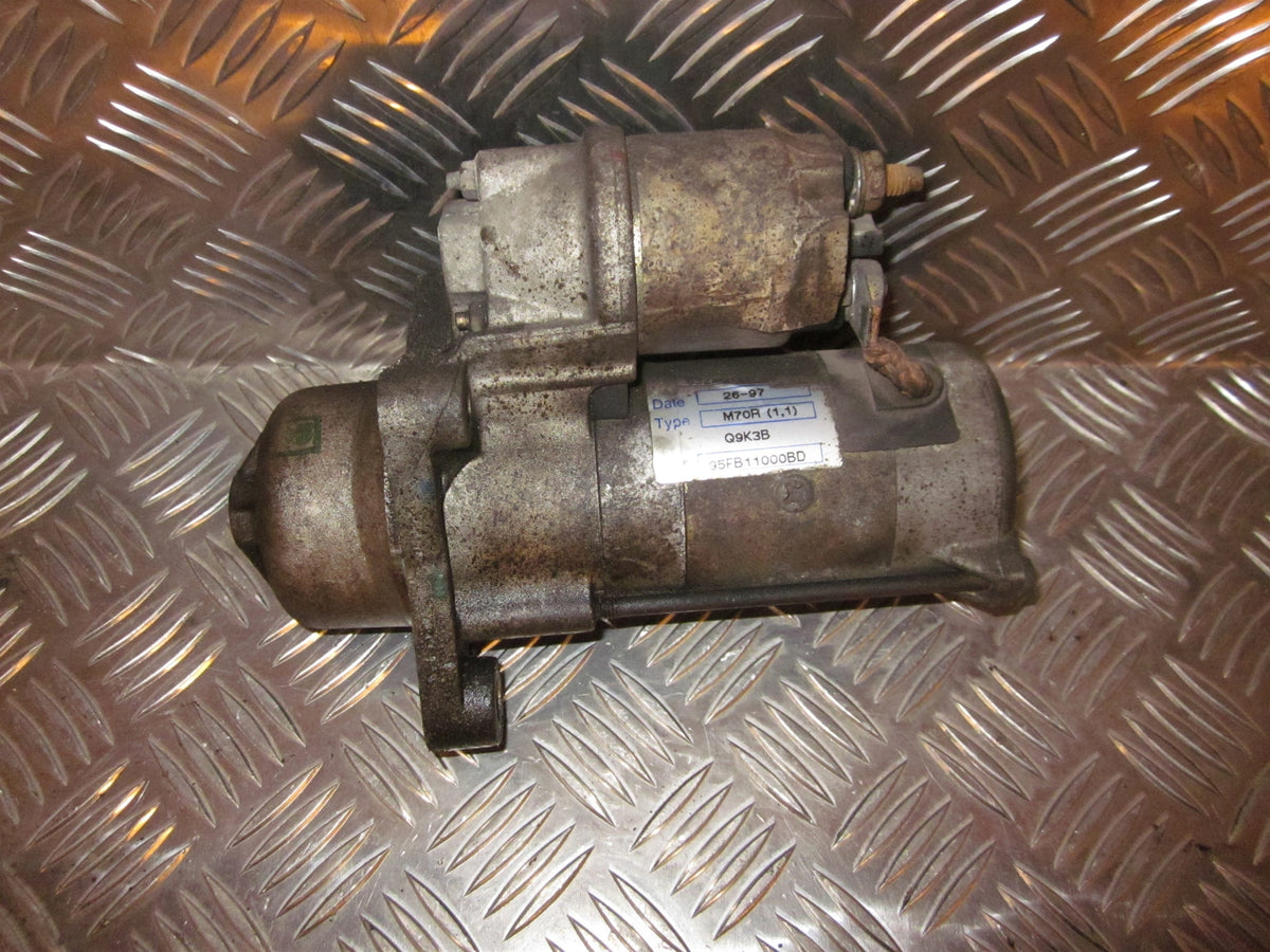 Mazda 121 Zq Starter Med OEM Nr. 1E0318400A Fra Mazda Ophugger