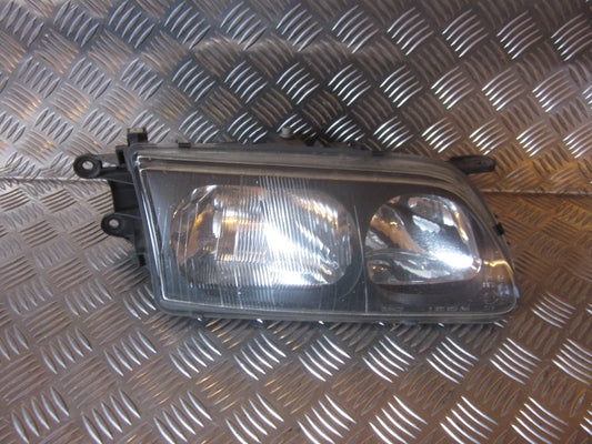 Mazda 626 GF/GW Forlygte Med OEM Nr. Ophugger Fra Mazda Ophugger