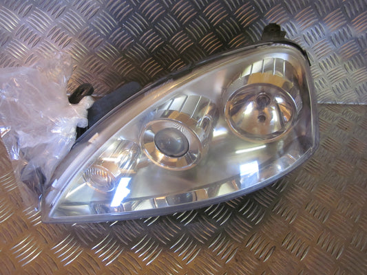 Opel Corsa C Forlygte Med OEM Nr. 13100535GG Fra Opel Ophugger