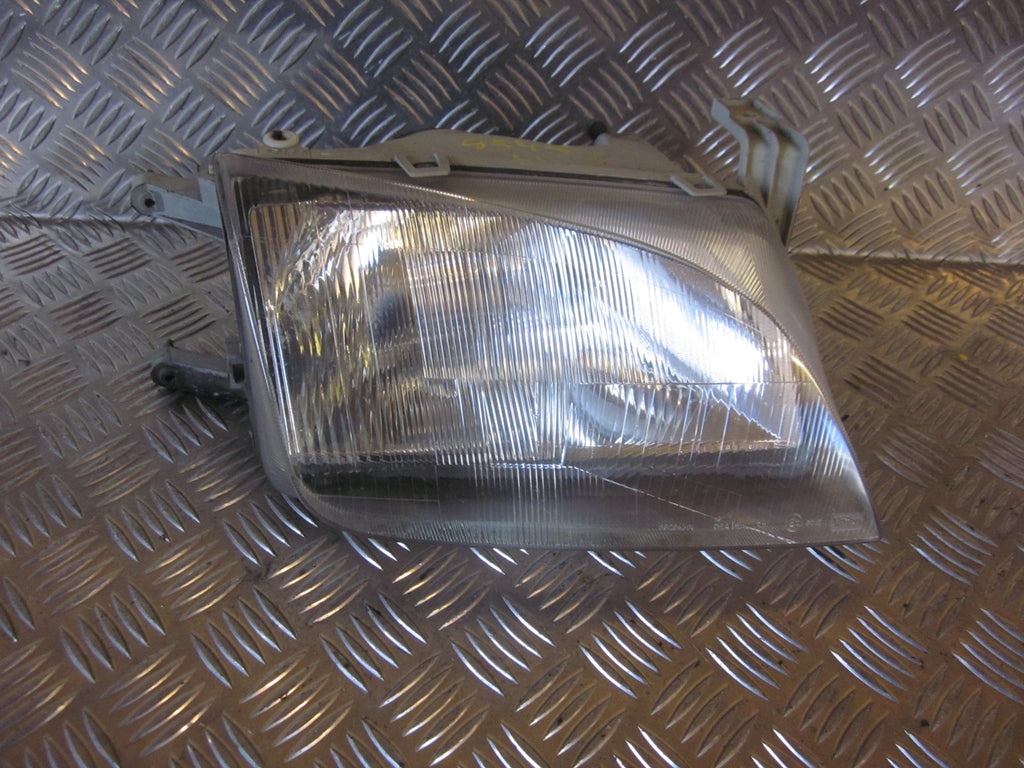 Suzuki Swift Forlygte Med OEM Nr. 3512180EB0 Fra Suzuki Ophugger