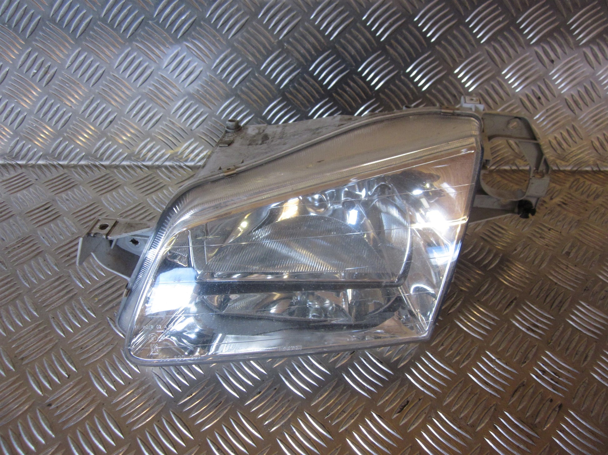 Mazda 323 S 4D BA12 Forlygte Med OEM Nr. BJ1V51040B Fra Mazda Ophugger