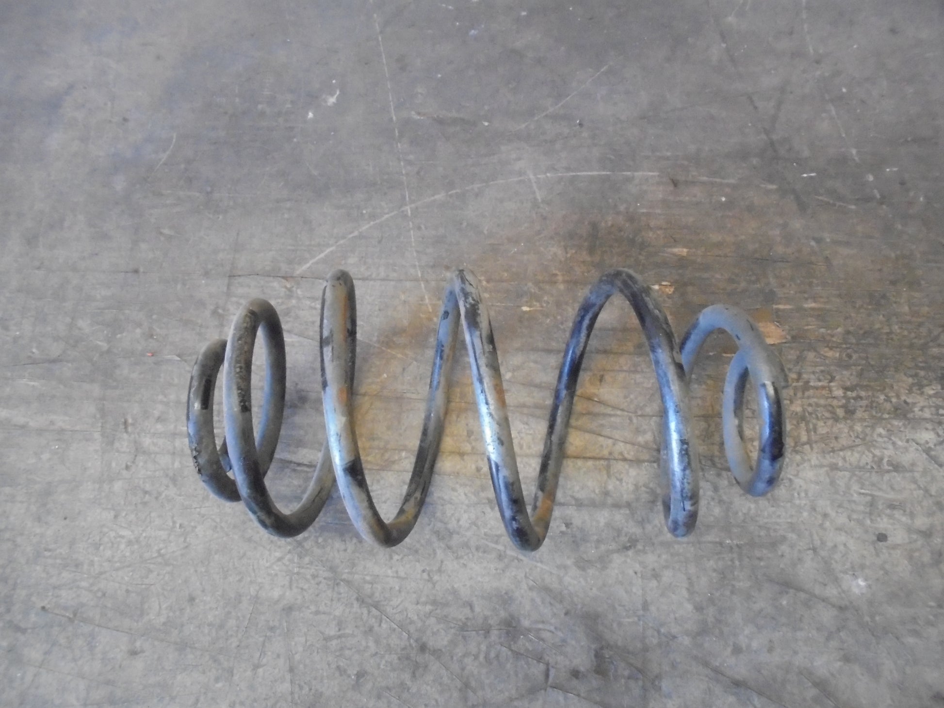 Opel Astra G Bagfjeder Spiral Med OEM Nr. Ophugger Fra Opel Ophugger