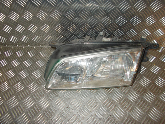 Mazda 626 GF/GW Forlygte Med OEM Nr. GG3E510L0A Fra Mazda Ophugger