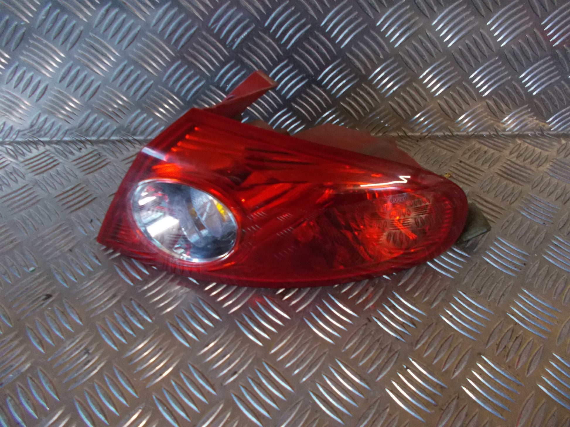 Chevrolet Lacetti Baglygte Med OEM Nr. Ophugger Fra Chevrolet Ophugger