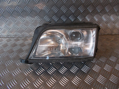 Audi A6 Forlygte Med OEM Nr. Ophugger Fra Audi Ophugger
