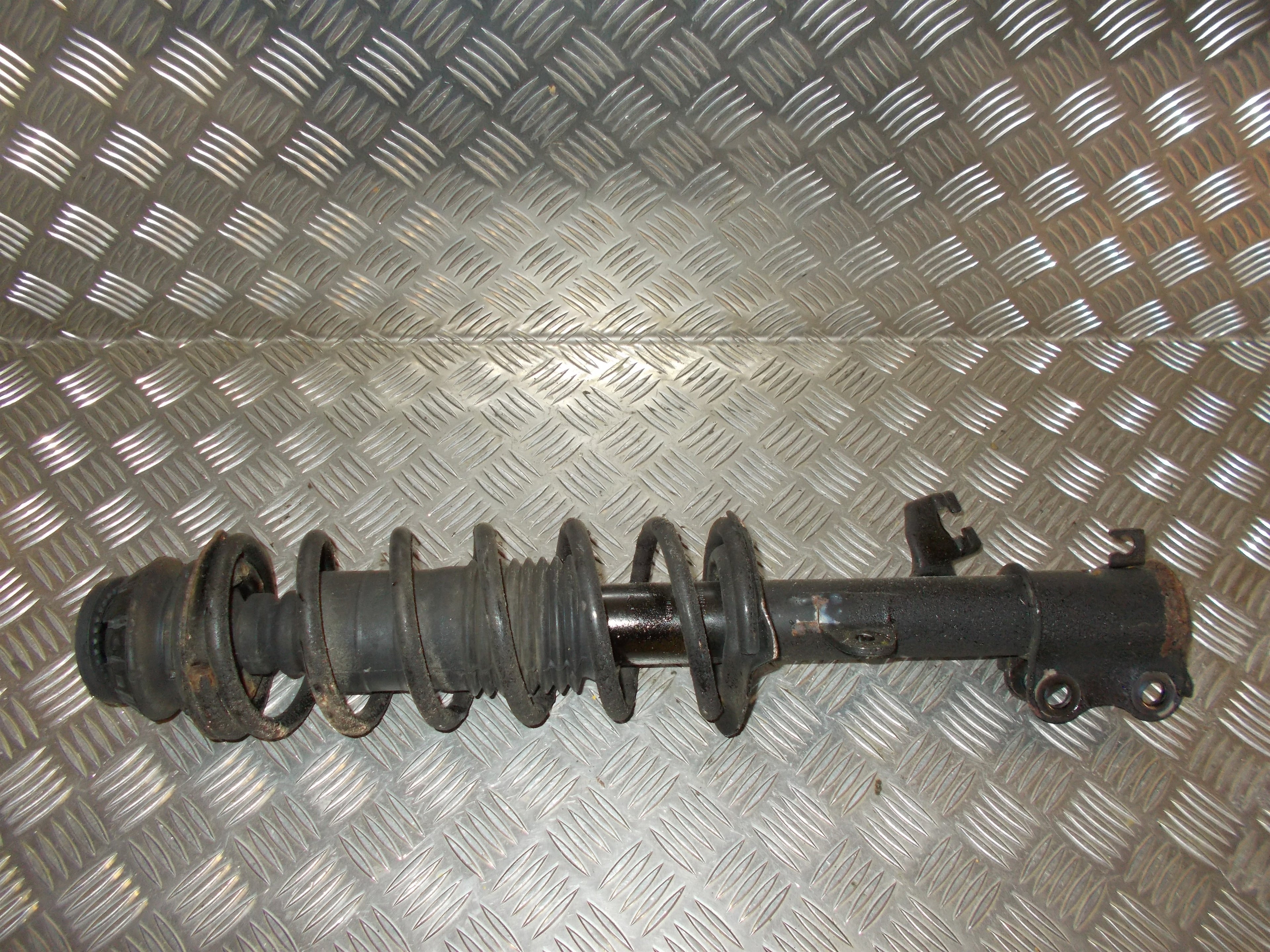Nissan Micra K13 Fjederben For H Med OEM Nr. 54302K Fra Nissan Ophugger