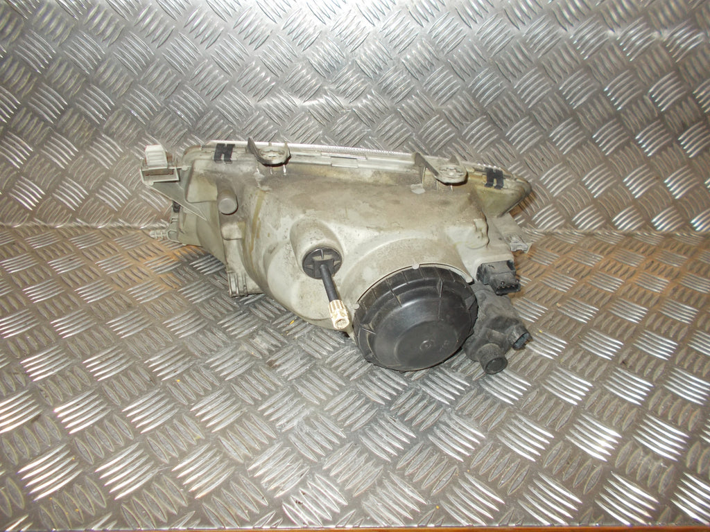 Saab 9-3 Forlygte Med OEM Nr. Ophugger Fra Saab Ophugger