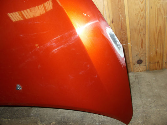 Suzuki Splash Fronthjelm Med OEM Nr. 5730051K00 Fra Suzuki Ophugger