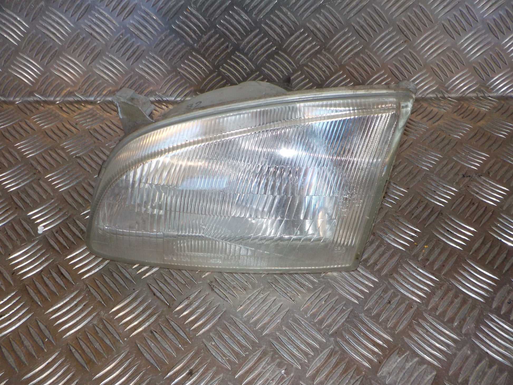 Toyota Starlet EP90 Forlygte Med OEM Nr. 8115010780 Fra Toyota Ophugger