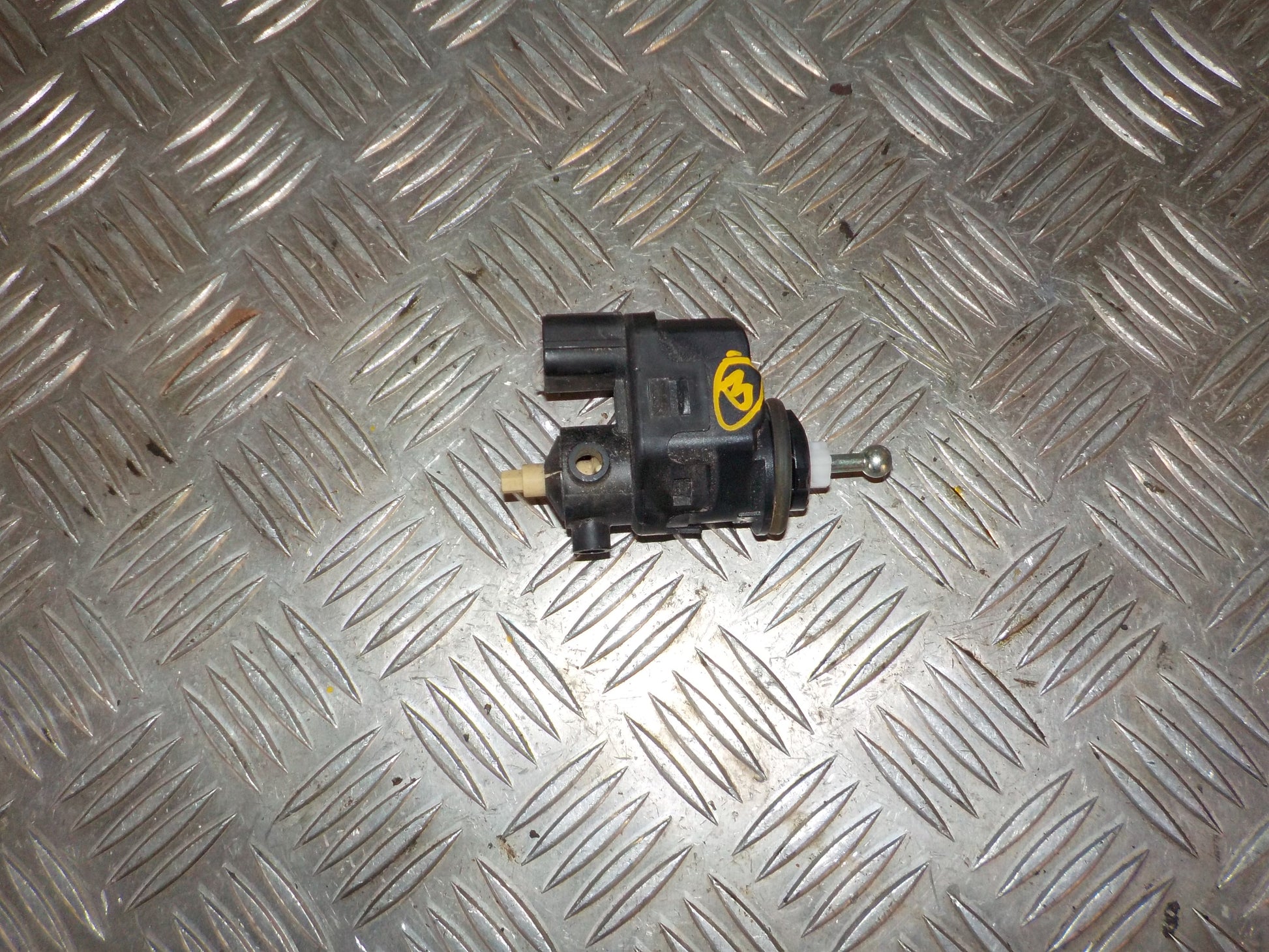 Mitsubishi Lancer Lygtejusterings Motor Med OEM Nr. 00787845AU Fra Mitsubishi Ophugger