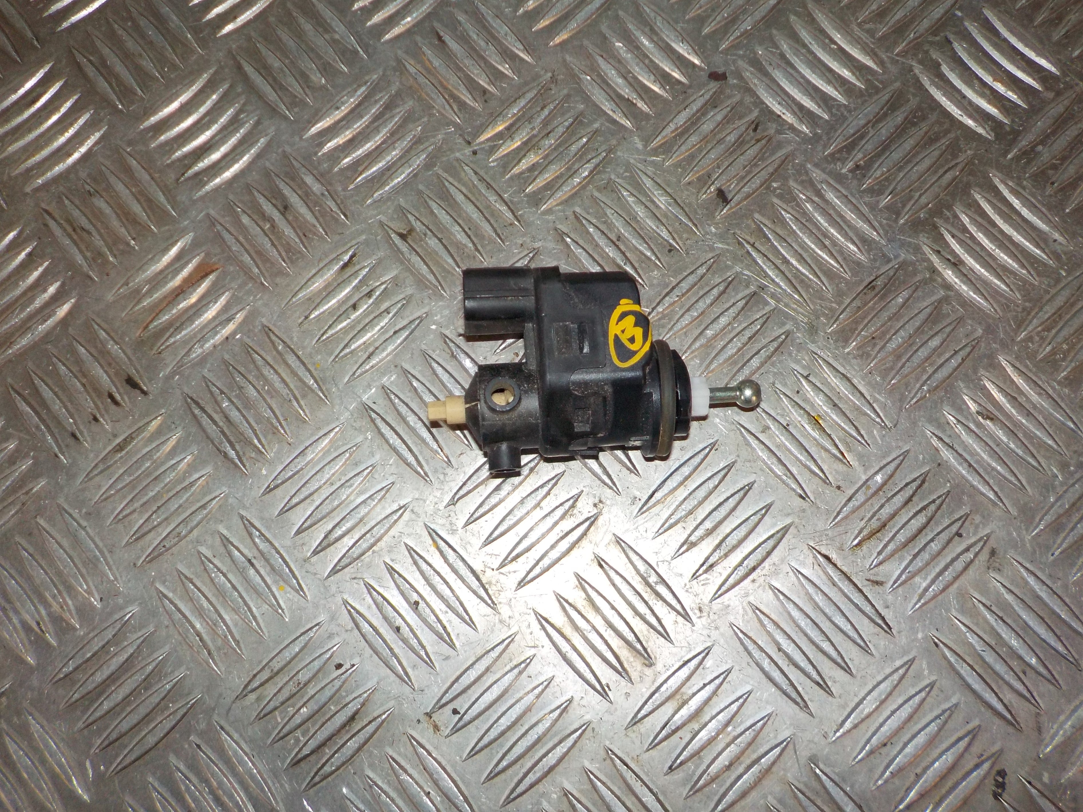 Mitsubishi Lancer Lygtejusterings Motor Med OEM Nr. 00787845AU Fra Mitsubishi Ophugger