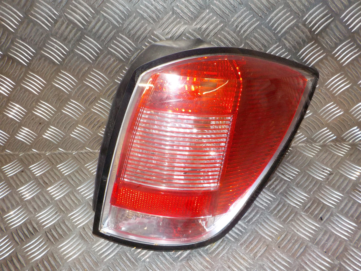 Opel Astra H Baglygte Med OEM Nr. 93186477 Fra Opel Ophugger