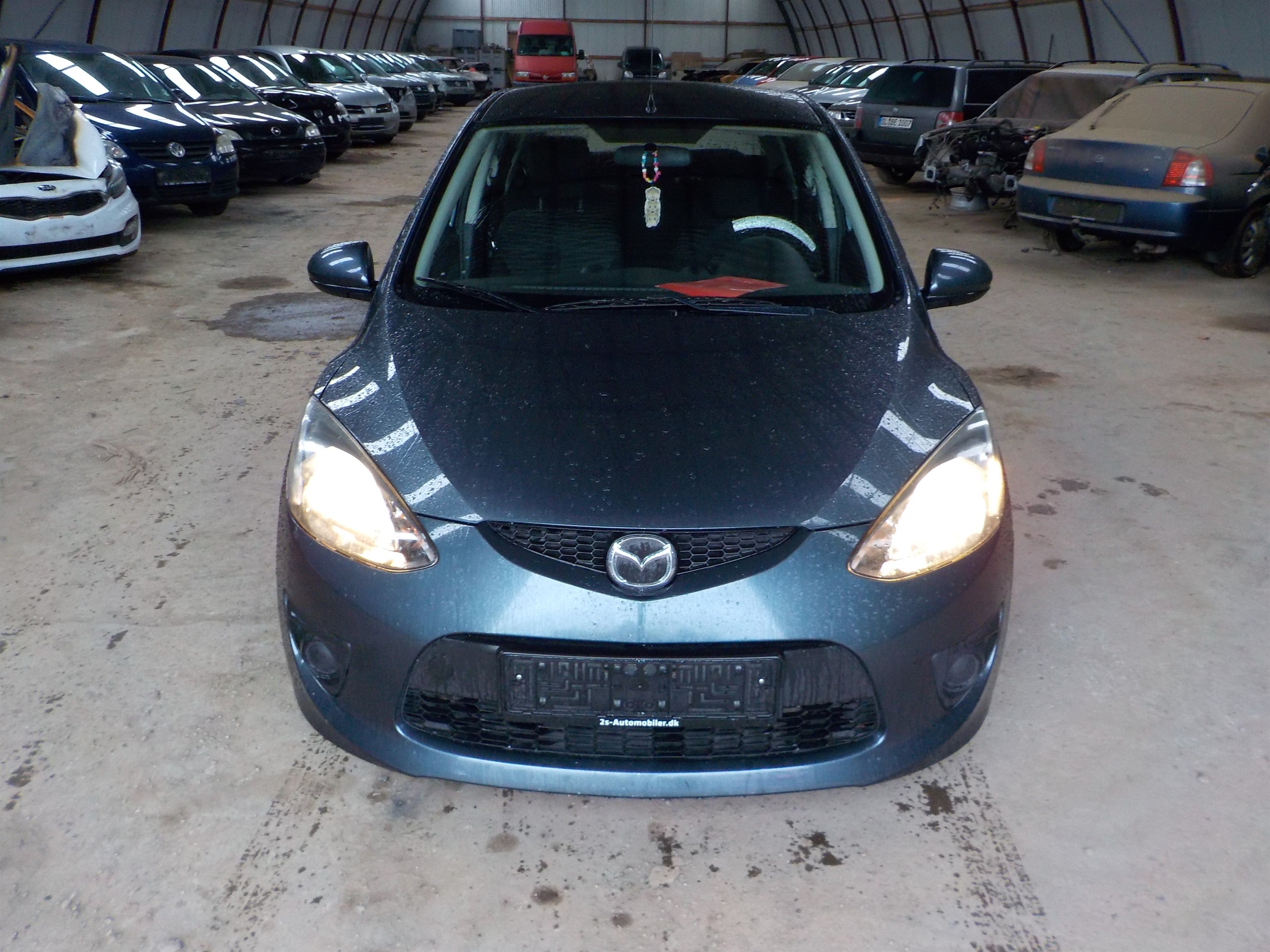 Mazda 2 De Pluk-Selv-Bil Med OEM Nr. Ophugger Fra Mazda Ophugger