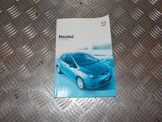 Mazda 2 DE Instruktionsbog Med OEM Nr. Ophugger Fra Mazda Ophugger