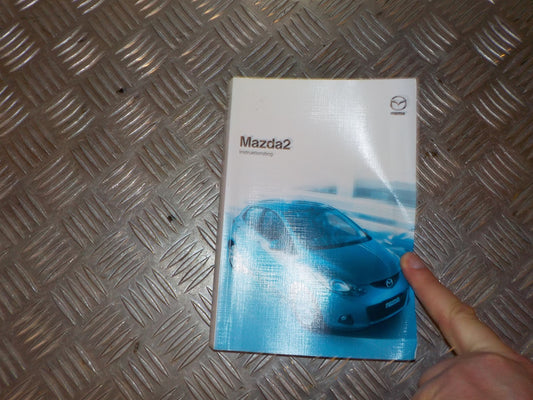 Mazda 2 DE Instruktionsbog Med OEM Nr. Ophugger Fra Mazda Ophugger