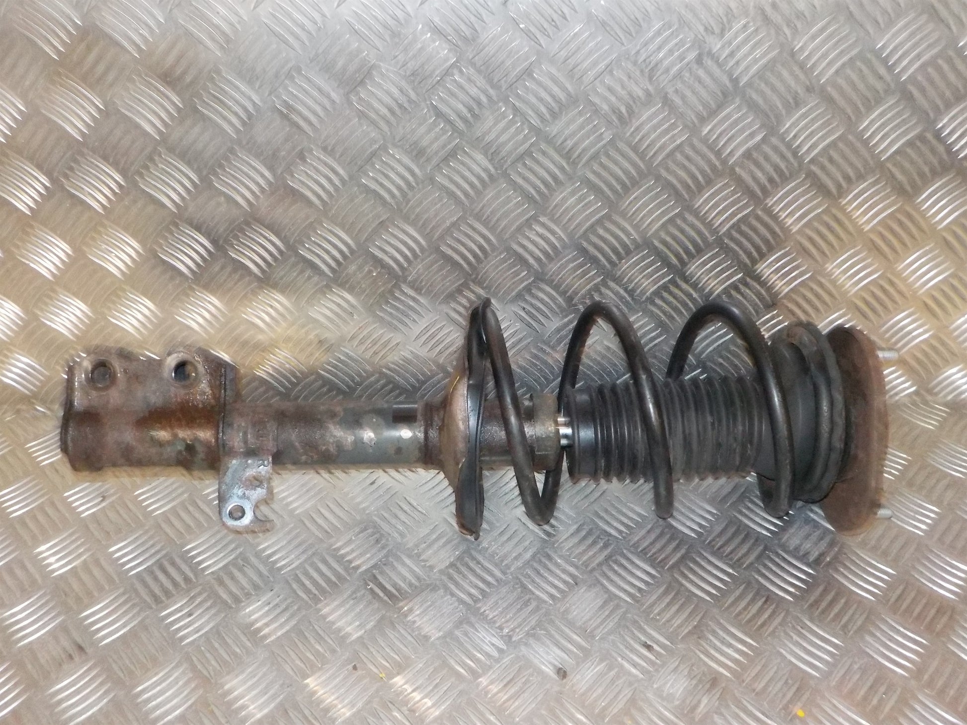 Toyota Corolla E12 Fjederben For H Med OEM Nr. 4851009701 Fra Toyota Ophugger