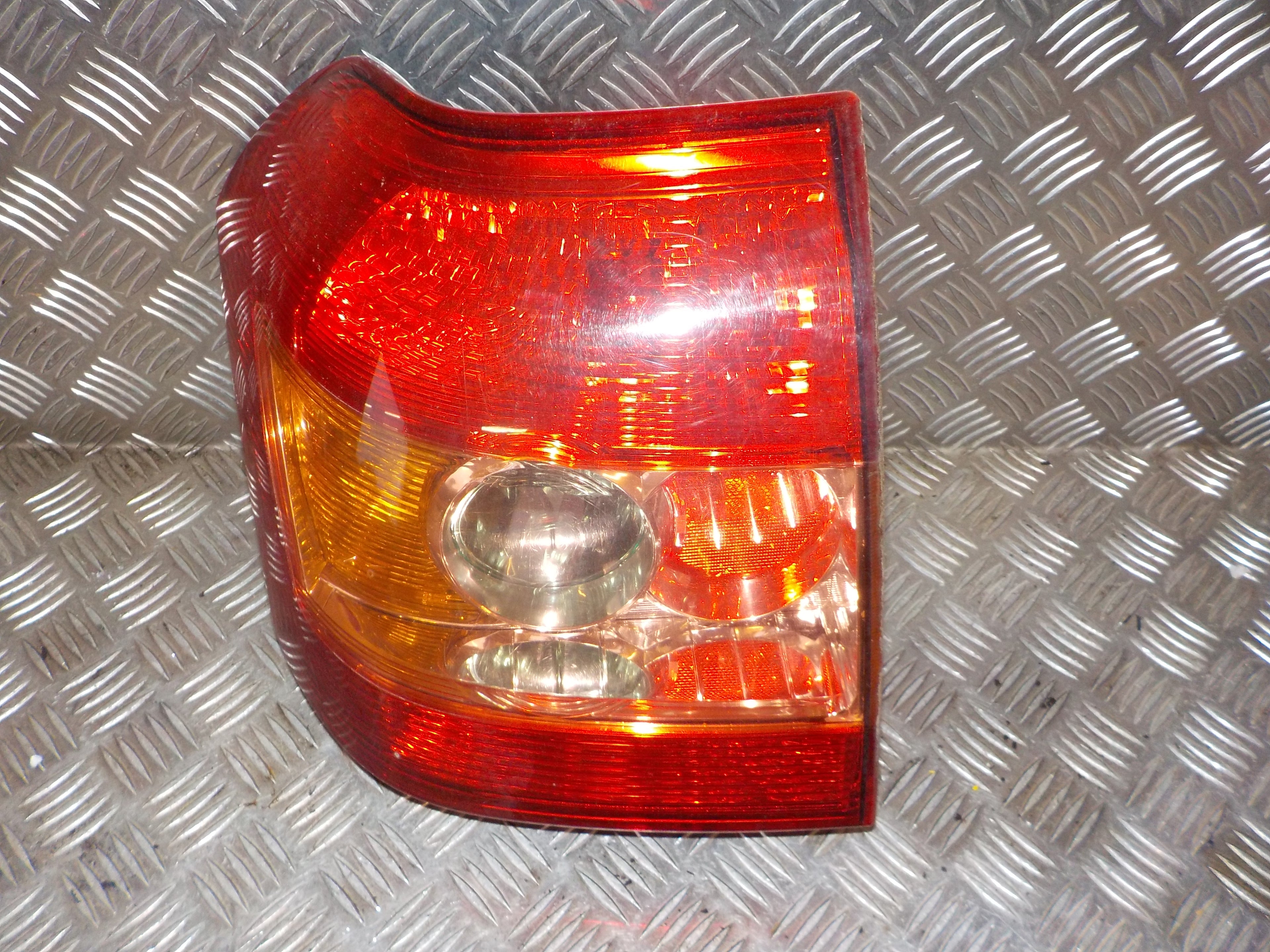 Toyota Corolla E12 Baglygte Med OEM Nr. 8149713010 Fra Toyota Ophugger