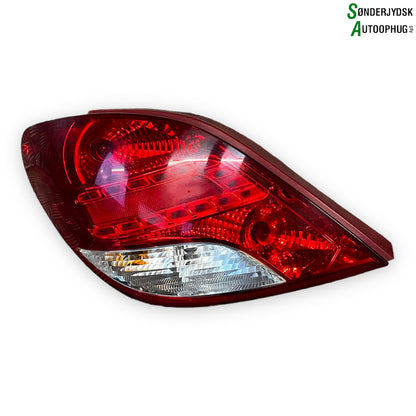 Peugeot 207 Baglygte Med OEM Nr. 6350HQ	 Fra Peugeot Ophugger