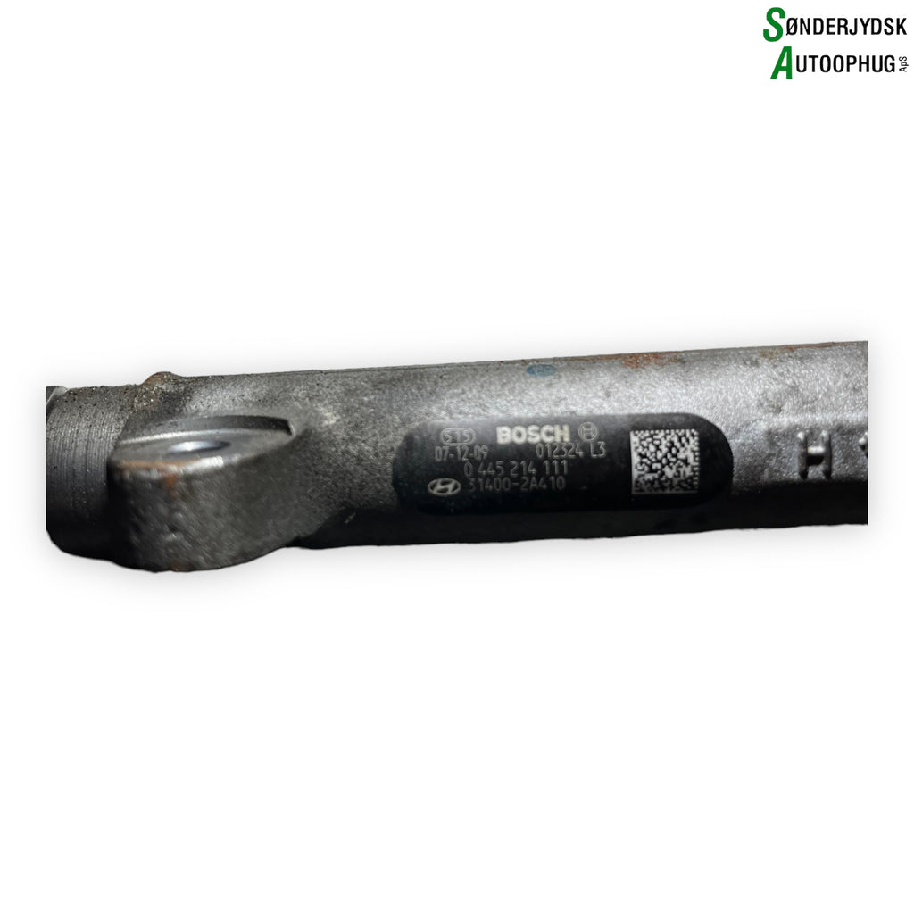 Hyundai I30 Km Rail Bro Med OEM Nr. 31002A410 Fra Hyundai Ophugger