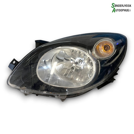 Renault Twingo 2 Forlygte Med OEM Nr. 260607587R Fra Renault Ophugger