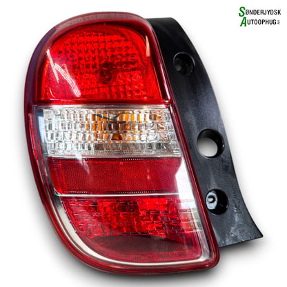 Nissan Micra K13 Baglygte Med OEM Nr. 89050366 Fra Nissan Ophugger