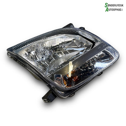 Suzuki Ignis Forlygte Med OEM Nr. 3512086G10000 Fra Suzuki Ophugger