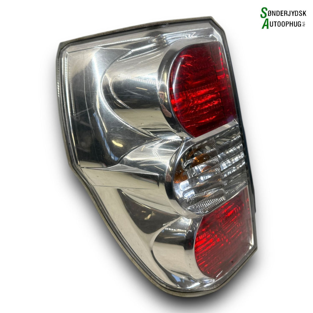 Suzuki Grand Vitara Baglygte Med OEM Nr. 3567064J11000 Fra Suzuki Ophugger
