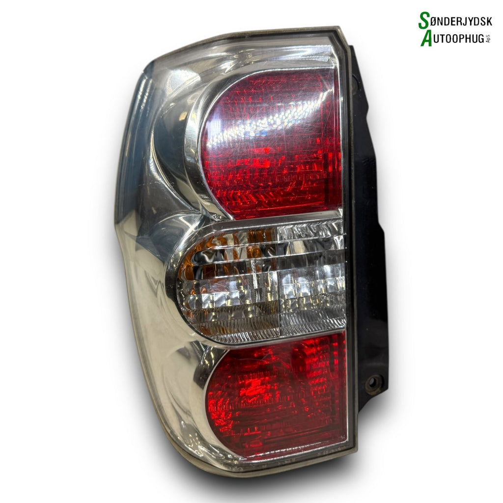 Suzuki Grand Vitara Baglygte Med OEM Nr. 3567064J10 Fra Suzuki Ophugger
