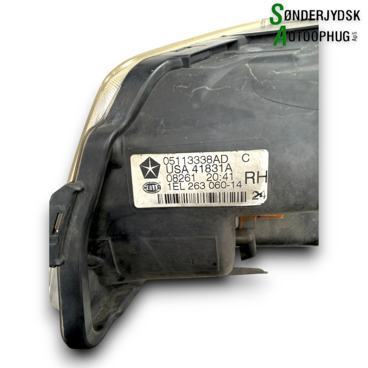 Chrysler Voyager Forlygte Med OEM Nr. 1EL26306014 Fra Chrysler Ophugger