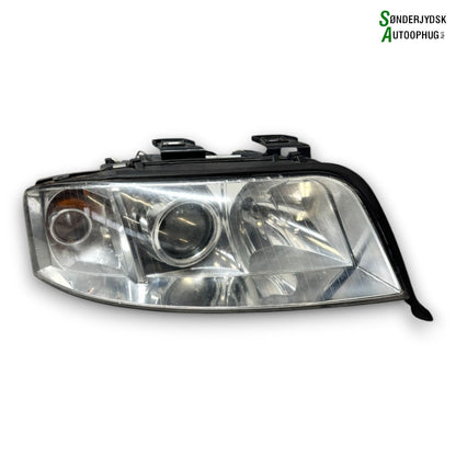 Audi A6 4B Forlygte Med OEM Nr. 4B0941004BJ Fra Audi Ophugger