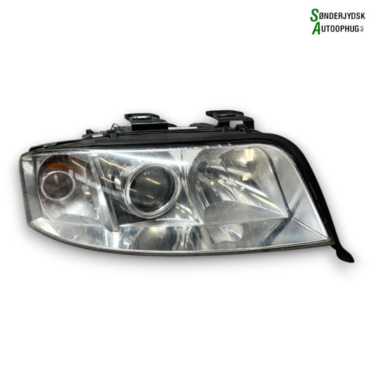 Audi A6 4B Forlygte Med OEM Nr. 4B0941004BJ Fra Audi Ophugger